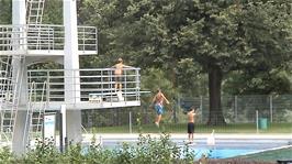 Local children jumping and diving at Aue Sports Centre, Baden, beside Route 5, 9.4 miles into the ride